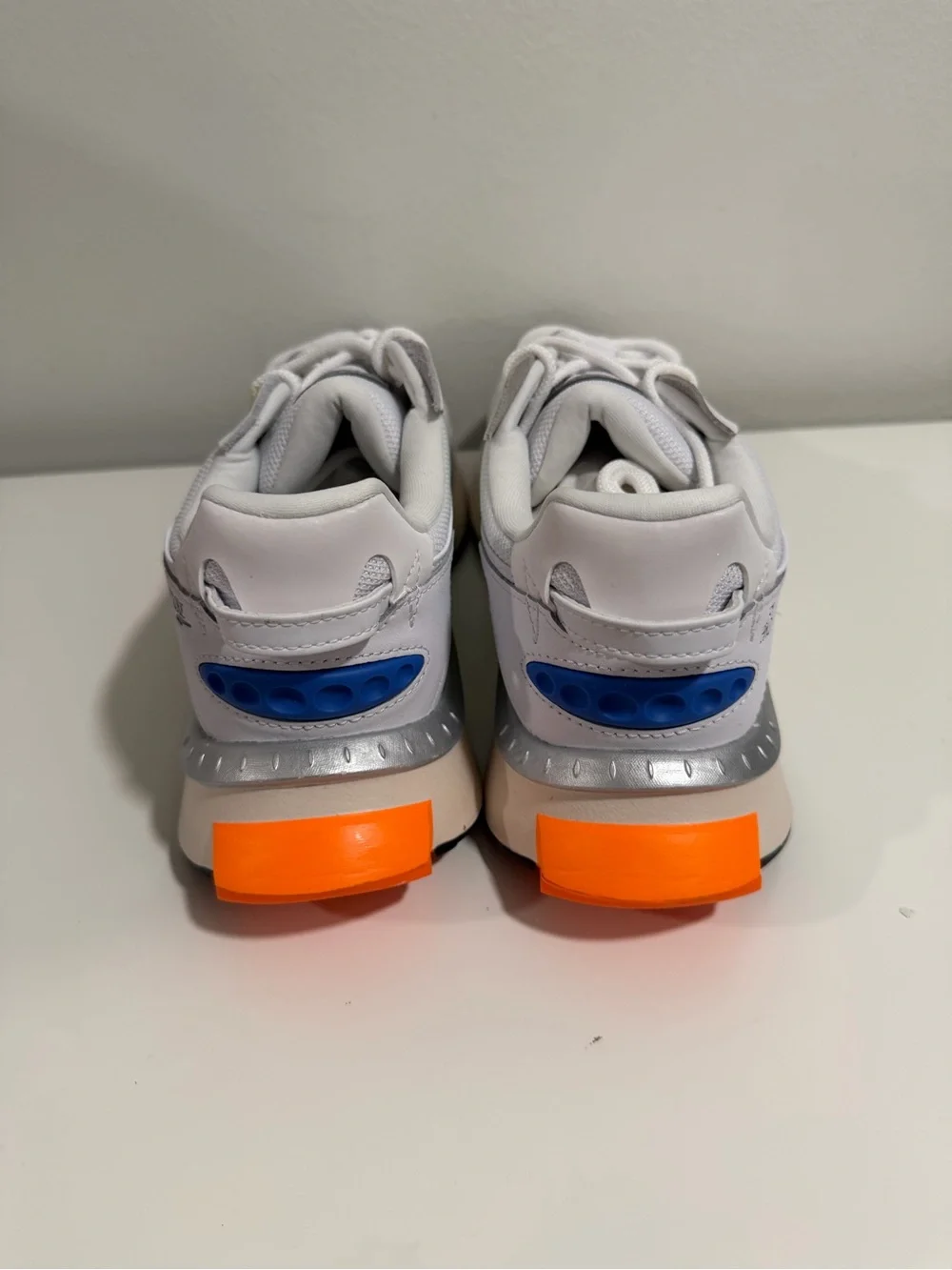 Puma White Sneakers with Neon Green and Orange Accents